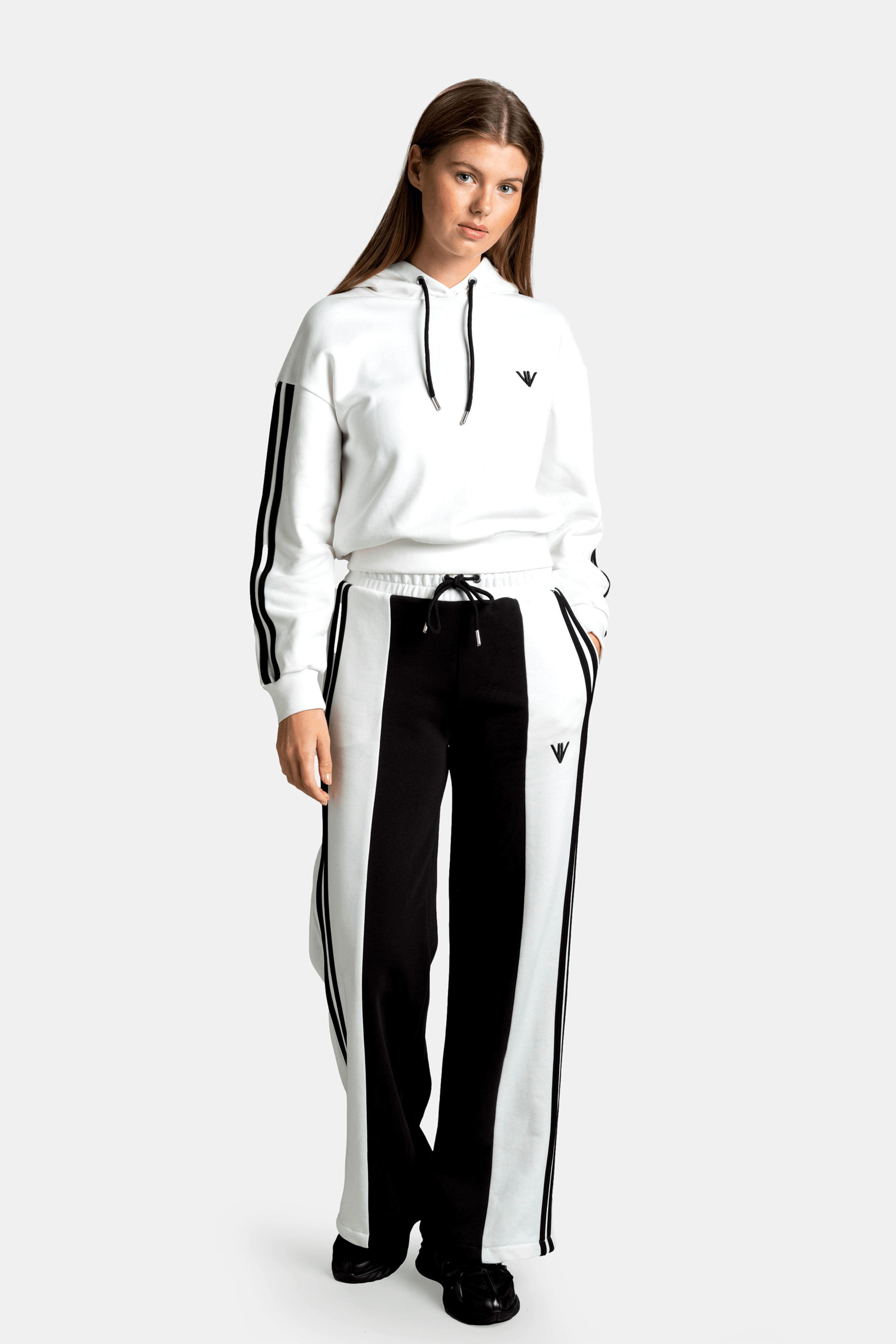 Adira - Color Block Tracksuit Set, full front view with hands in pockets for a relaxed look.