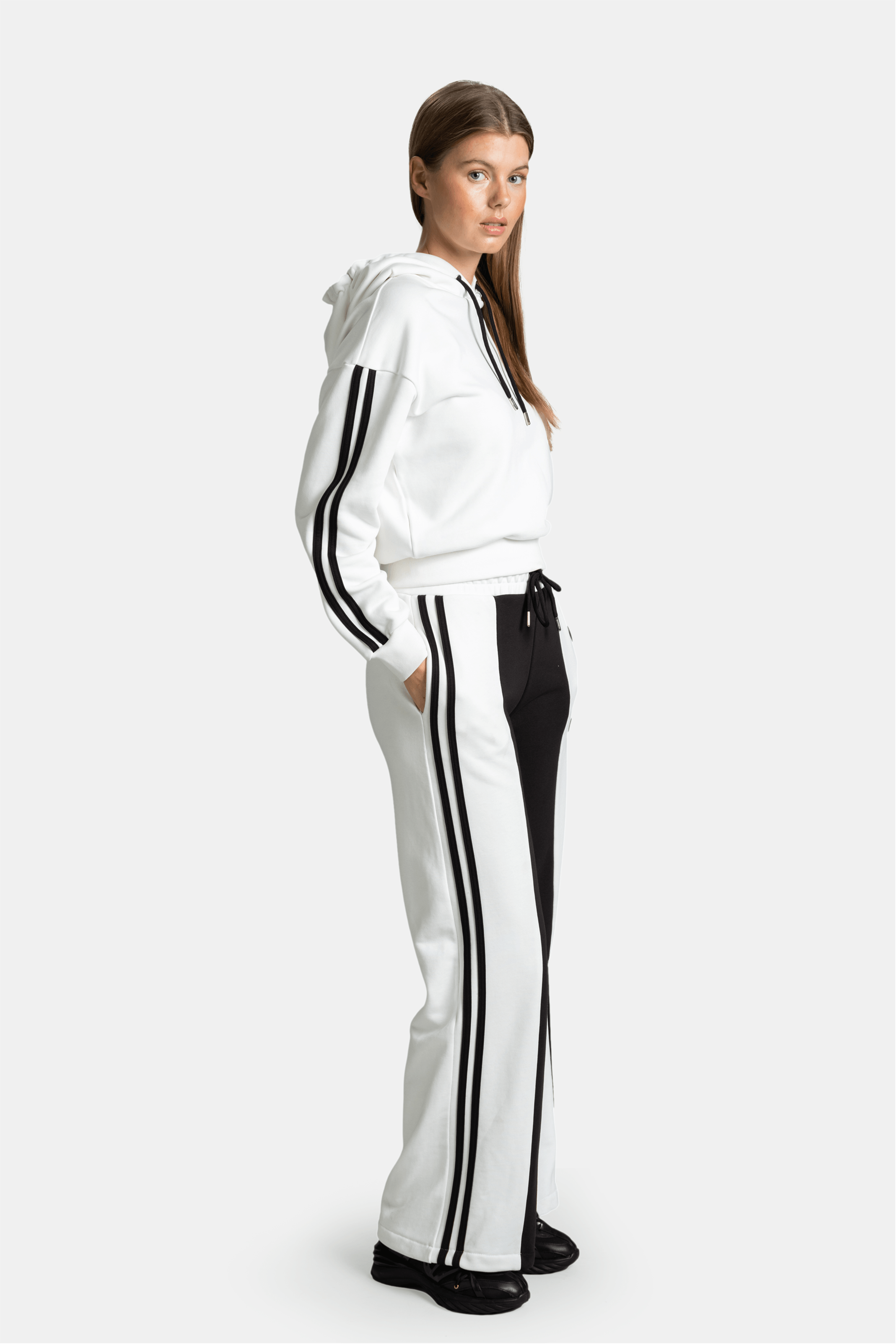 Adira - Color Block Tracksuit Set, side view displaying the color transitions and relaxed fit.