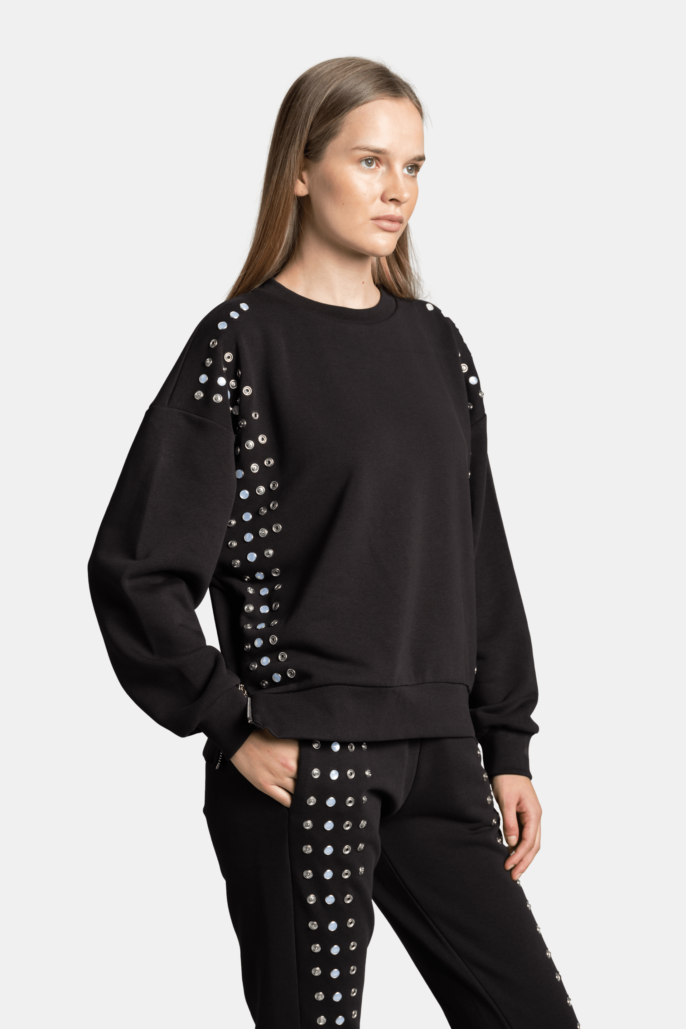 Amaya - Studded Tracksuit Set, close-up of front view displaying studded embellishments on the sweatshirt.