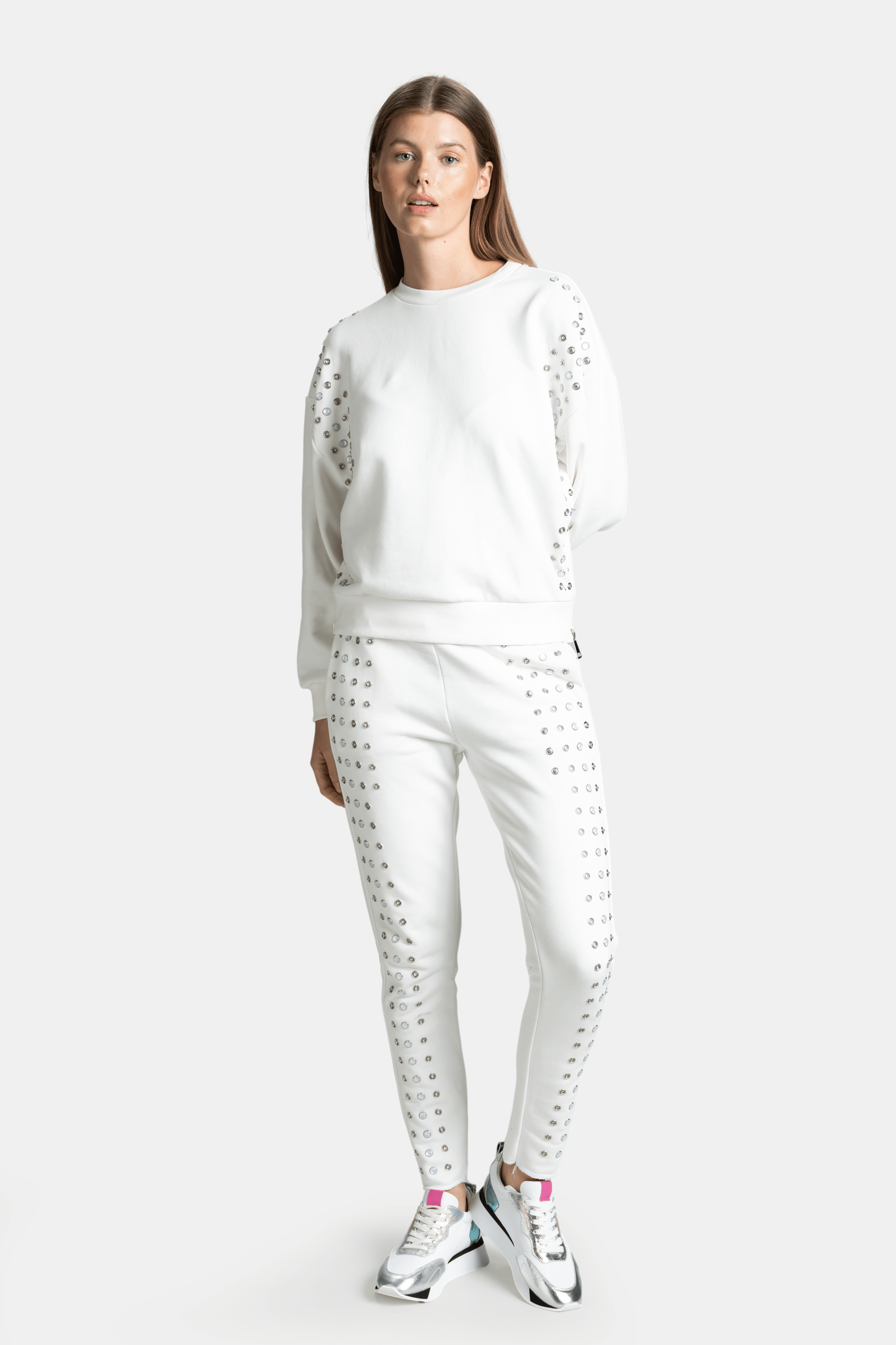 Amaya - Studded Tracksuit Set in Ecru, front view with model standing in a relaxed pose.