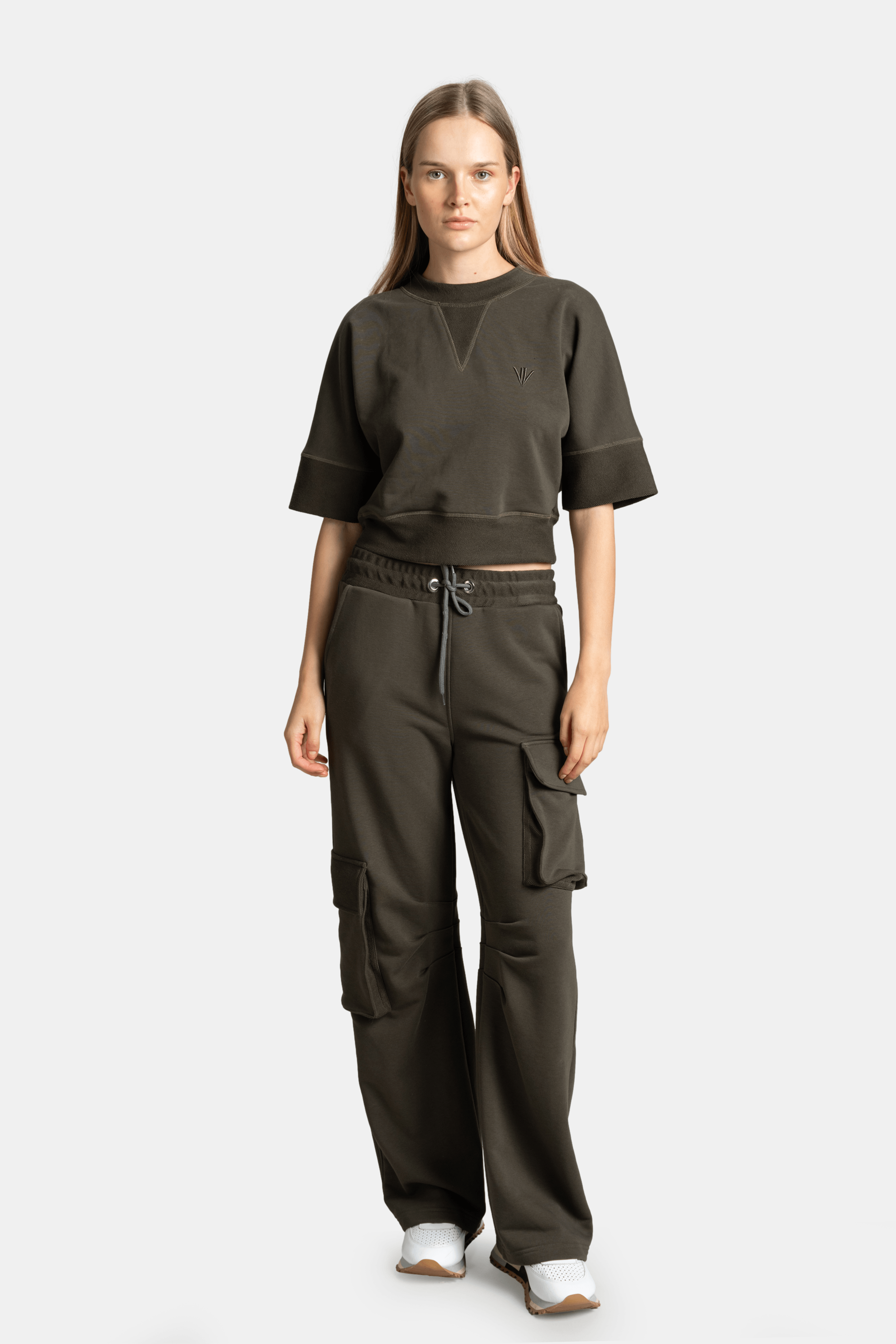 Meira Cargo Jogger Tracksuit Set in Khaki, front view showcasing the model wearing a relaxed fit jogger and cropped top, highlighting the casual yet stylish design of the set.