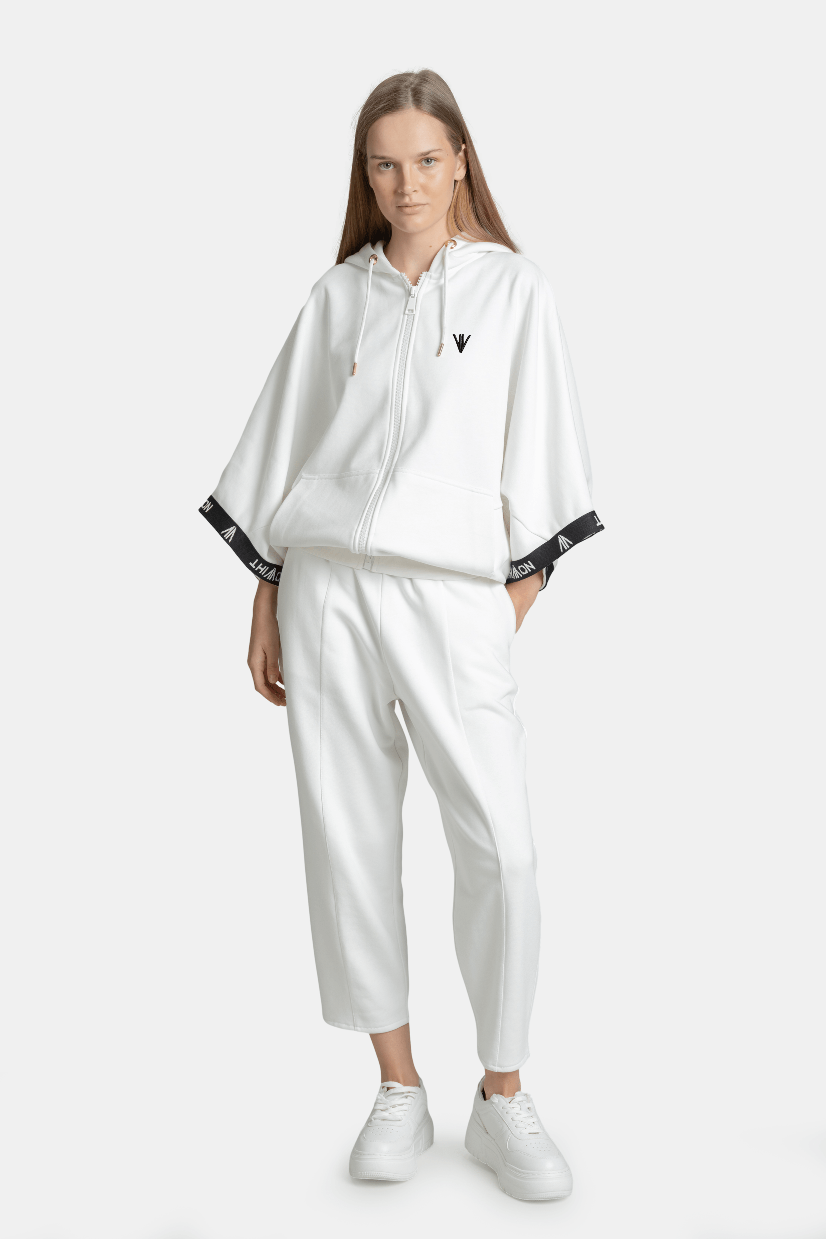 Front view of Elif - Parachute Sleeve Tracksuit Set in White, showcasing relaxed fit and minimalistic design.