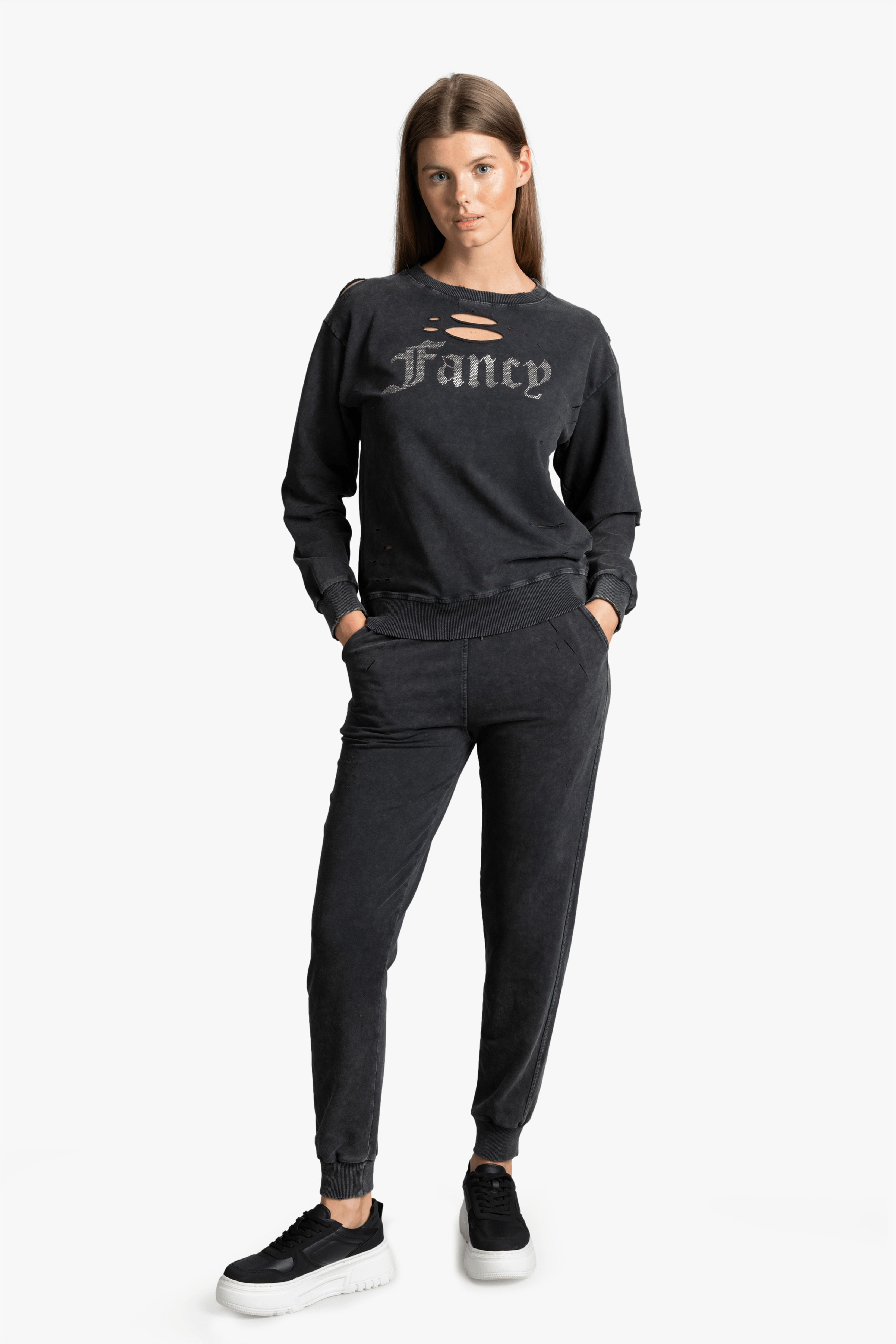 Women's distressed black sweatshirt and joggers set featuring 'Fancy' text in gothic font, casual and trendy loungewear style for modern street fashion lovers.